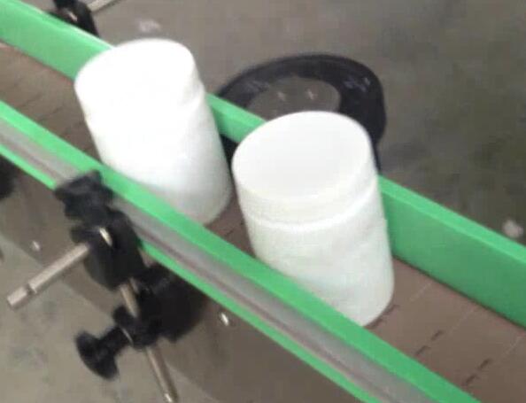 Etichettatrice per bottiglie tonde, imbottigliatrice ed etichettatrice per barattoli di suger