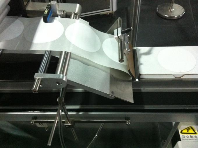 Etichettatrice superiore autoadesiva per barattoli / cartoni / contenitori