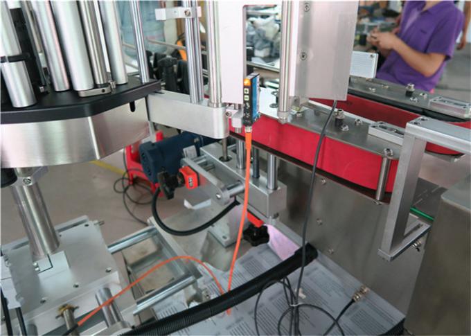 Etichettatrice per adesivi per bottiglie rotonde con occhio magico importato ad alta precisione